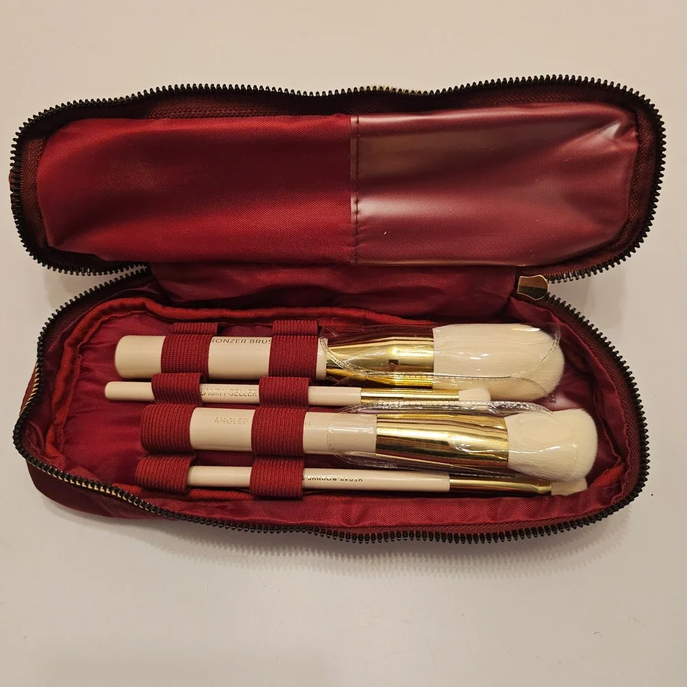 Laura Geller Quilted Burgundy Makeup Bag and 4 Piece Professional Brush Set Gold
